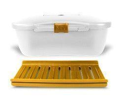 White hygienic storage box with yellow locking tray for discreet, germ-free organization