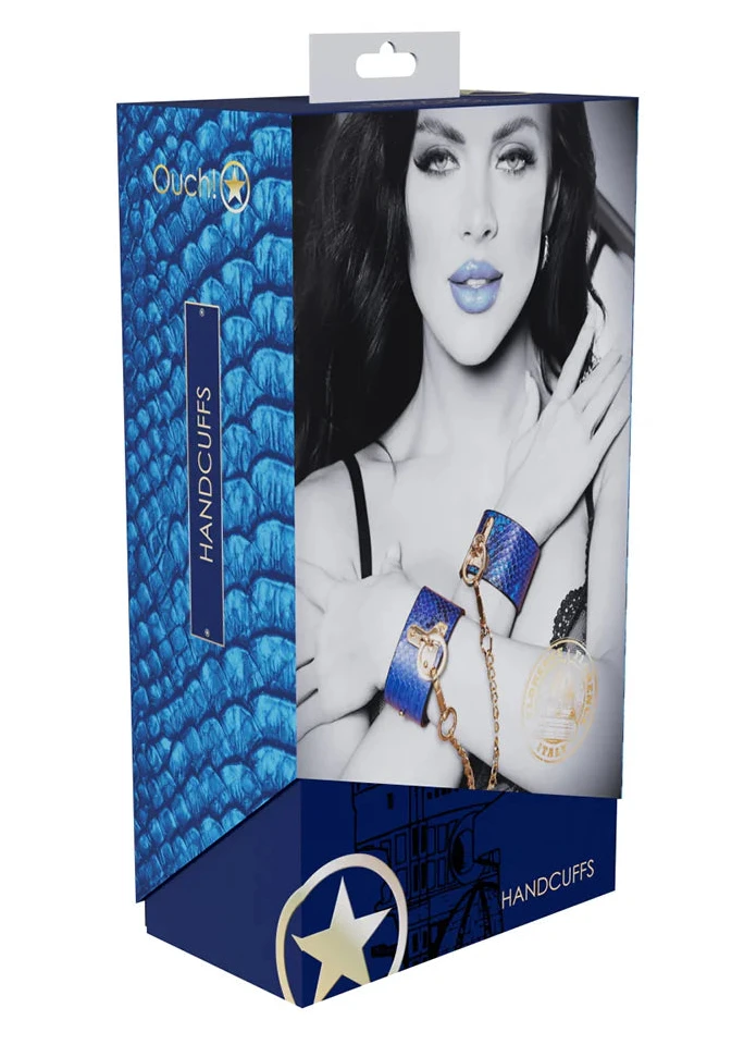 Box of handcuffs with a model wearing them, featuring the brand 'Ouch. Jewish Joyboxx - Great for tying up terrorists